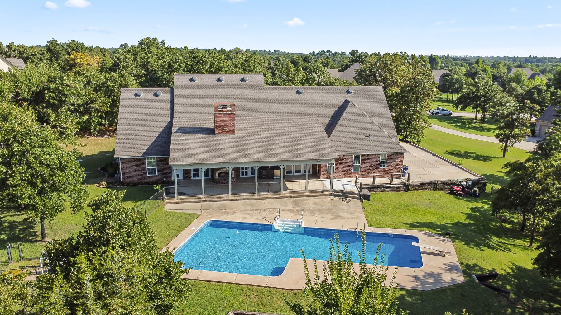 Aerial view of a property and its lot