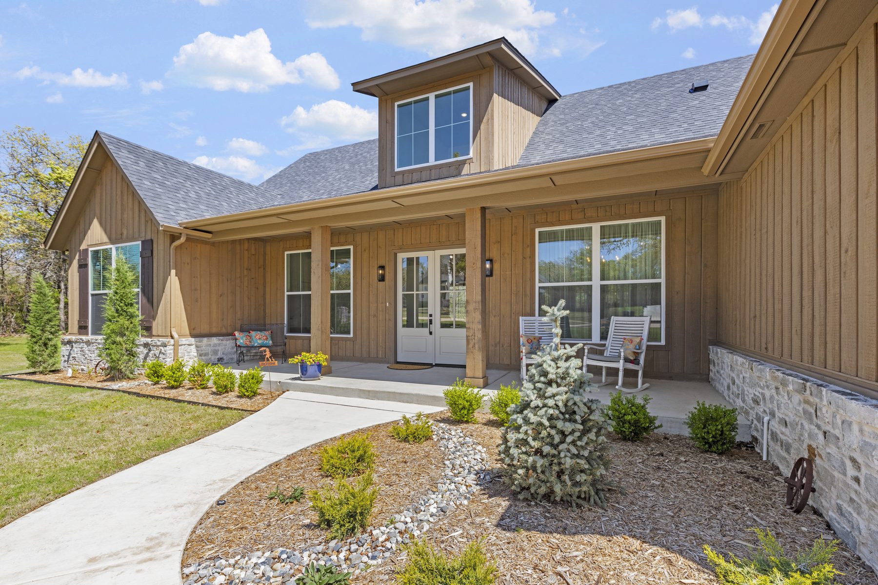Stone-accented home exterior in daylight